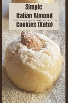 a close up of a doughnut on a table with the words simple italian almond cookies keto