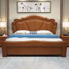 a large bed sitting inside of a bedroom next to two nightstands on either side of the bed