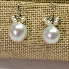 DESCRIPTION: Thank you for coming in! 14K solid white gold earrings with 11mm South Sea white baroque pearls and seed pearl accents! Full of luster and elegance! ! It looks much much nicer on your ears! You will receive the exact pair of earrings in the pictures! WEIGHT: 4.63 Grams LENGTH: 1 inch MATERIAL: 14K Solid White Gold, South Sea White Pearl, Seed Pearls Luxury Briolette Pearl Drop Earrings, Classic White Briolette Earrings, Silver Dangle Pearl Earrings With High Luster, Silver Pearl Earrings With High Luster, White Baroque Pearl Earrings, Round Shape, White Gold Briolette Earrings For Wedding, White High Luster Pearl Drop Earrings, High Luster Silver Pearl Earrings, White Gold Akoya Pearl Dangle Earrings