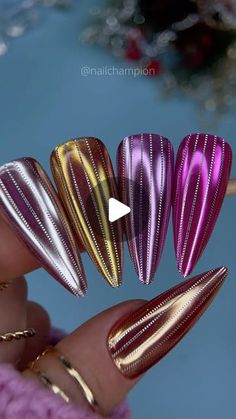 four different metallic nail designs on someone's finger