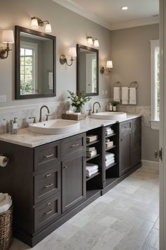 a large bathroom with double sinks and mirrors