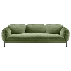 a green velvet couch with metal legs and back rests on an isolated white background,