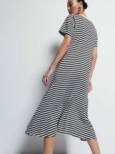 It's your essential t-shirt dress, now with subtle seamed pleats on the front for an effortlessly feminine silhouette. Perfect for moving from off-duty to on-duty with nothing more than a chic belt around the waist. (This one comes in City Stripe.) | Eileen Dress in City Stripe | Ethical Essentials Casual Short Sleeve Maxi Dress With Side Slits, Casual Longline Midi Dress With Relaxed Fit, Relaxed Fit Casual Maxi Dress For Work, Casual Relaxed Fit Maxi Dress For Work, Casual T-shirt Dress For Summer Workwear, Casual Short Sleeve Maxi Dress With Relaxed Fit, Casual Longline Midi Dress For Loungewear, Casual Longline Dresses For Work, Casual Short Sleeve Maxi Dress For Work