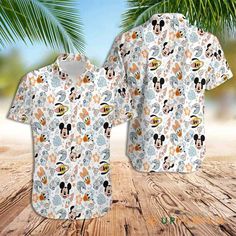 Mickey Aloha Shirt Mickey Mouse Hawaiian Shirt Surf Beach Magic Mickey Mouse Best Hawaiian Shirts The Hawaiian shirt embodies the spirit of laid-back elegance. With its vibrant, tropical patterns and lightweight fabric, it captures the essence of leisure and relaxation. These shirts, often made from breathable materials like cotton or silk, boast colorful floral or nature-inspired designs, reflecting the beauty of the islands. Their loose, comfortable fit and short sleeves make them ideal for wa Beach Magic, Tropical Patterns, Hawaiian Shirt Women, Aloha Spirit, Summer Gathering, Cool Hawaiian Shirts, Nature Inspired Design, Polo Shirt Women, Hawaiian Style