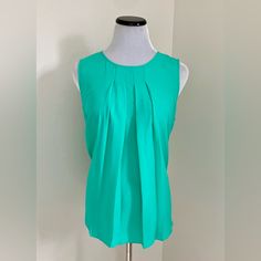 Nwt Micheal Kors Blouse. Size Large With Front Pleats. States Aqua In Color, I Find It Most Similar To The Medium Green Spring As Pictured. 100 Percent Poly Approximately 21 Inches Armpit To Armpit Approximately 26!Inches Long. Handkerchief Hem Top, Coral Tie, Kimono Sleeve Top, Gray Cap, Navy Blue Blouse, Petal Sleeve, Green Spring, Square Neck Top, Scoop Neck Top