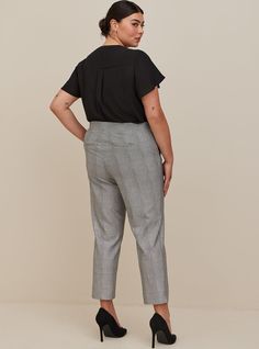 FIT Model is 5'10” wearing size 12. High rise. . Eased through the hip and thigh with a tapered leg. Pull-on elastic waist. Tapered leg hits just above the ankle. . Inseam: 27”. MATERIALS + CARE Studio Luxe Ponte knit fabric: Our signature work (any) wear fabric with office-approved tailoring, WFH stretch and comfort, and curve-loving hold. Plus, it’s machine washable! Stretch level: Maximum. Wrinkle resistant. 68% rayon, 28% nylon, 4% spandex. Machine wash cold. Line dry. Imported. DETAILS Pull Relaxed Fit Tapered Bottoms With Belt Loops, Tapered Bottoms With Elastic Waistband For Workwear, Tapered Elastic Waistband Bottoms For Workwear, Tapered Ankle-length Bottoms With Hip Pockets, High-waisted Tapered Bottoms With Elastic Waistband, Fitted Tapered Leg Bottoms With Elastic Waistband, Tapered Workwear Bottoms With Hip Pockets, Fitted Bottoms With Elastic Waistband And Tapered Leg, Relaxed Fit Tapered Bottoms For Business Casual