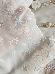 "2 Yards Lace Trim Lovey Pink Blue Daisy Flowers Embroidered Ivory Chiffon Tulle Lace 7.87 Inches Wide High Quality Width: 7.87\"(20cm) This listing is for 2 yards. All the lace are perfect for lingerie, bra, dresses, dolls, bridal veil, altered art, couture, costume, jewelry design, pillowcase, home decor and other projects you could imagine. Limited stock and no restocking. If you like it, order it now. For more quantity, please feel free to convo me for custom listing." White Floral Embroidery Lace For Summer Weddings, White Floral Embroidered Lace For Summer Wedding, Summer Wedding Lace With Floral Embroidery, Cream Tulle Fabric With Floral Embroidery, Spring Sheer White Lace, White Sheer Lace For Spring, Beige Lace For Spring Wedding, Beige Lace For Summer Wedding, Beige Summer Wedding Lace