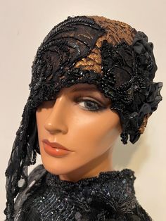 This is beautiful Ladies lace hat , headdress, wrap is in flapper style has my handmade design is in version of my collection fabulous 20's style hats and accessory heirloom Ludascrafts"LudasHatBoutique". Ladies wrap for any occasions,daytime, church. You can wear it many different ways with any dress and will look great costume outfits Era. Hat made from  stretchy  black lace, adorned antique style artwork is in Millinery style, floral, beaded accent,, velvet floral black lace fringes both sides,trim , family pattern early  and later 1890's, fully stitching by my  hands Measurement: Inside: 24". Mannequin's head about 22". Check measure around your ears, flapper hat fit over them and low on the brow. Crown: 16" .You can wear it many different ways with any dress and will look gorgeous.Onl Fitted Black Headpiece For Vintage Events, Black Flapper Headpiece For Costume Party, Black Flapper Headpieces For Vintage Events, Black Gatsby Style Hats For Evening, Black Fitted Gatsby Headpiece, Flapper Style Fascinator For Kentucky Derby Evening, Flapper Style Evening Fascinator For Kentucky Derby, Flapper Headpieces For Costume Party, Fitted Flapper Headpieces For Costume Party