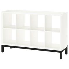 a white bookcase with black legs and shelves