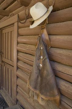 size: 12x8in Photographic Print: USA, Montana, Livingston, cowboy hat and chaps hanging on barn wall. by Merrill Images : Cowboy Hat Hanging, Cowboy Chaps, Horse Barn Ideas Stables, Ranch House Decor, Cowboy Decorations, Barn Ideas, Horse Barn, Baby Boy Rooms, Barn Style