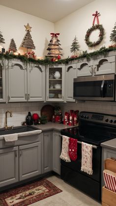 Transform your kitchen into a festive wonderland with these Christmas kitchen decor ideas From country cabinets to easy DIY gold accents get inspired with simple rustic red and white decor ideas that are perfect for a cozy apartment setting