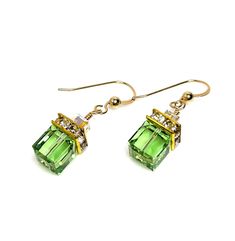 Peridot Green Austrian Crystal Cube Earrings These gorgeous earrings are created with 8mm peridot green Austrian crystal cubes, cz crystal square spacer beads and 6mm clear Austrian crystal rondells. They are mounted onto gold filled ear wires. These little gems are perfect for adding a little sparkle to an outfit. ♥ Crystals - Austrian Crystal 8mm  ♥ Crystal Colours - Peridot Green ♥ Earring Wires - Gold Filled ♥ Earring length - 1 inch drop The earrings will come safely packaged in a lovely gi Green Formal Earrings With Ear Wire, Green Peridot Earrings For Anniversary, Elegant Lime Green Earrings For Gift, Peridot Lime Green Earrings For Gift, Peridot Lime Green Earrings As Gift, Lime Green Peridot Earrings As Gift, Peridot Earrings In Lime Green As A Gift, Green Peridot Dangle Earrings, Green Crystal Earrings For May Birthstone Gift