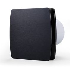 a black and white wall mounted speaker with an oval button on the back of it