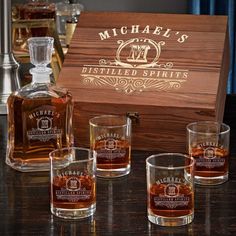 the personalized whiskey gift set includes four glasses and a wooden box