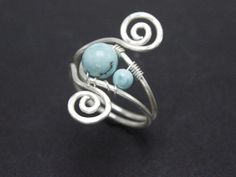 Silver Plated Copper Stone Wire Wrapped Adjustable Ring Jewelry, Turquoise Gemstone Handmade Hammered Ring, Armenian Homemade Jewelry https://www.etsy.com/ArmenianSunnySilver/listing/1318955447/silver-plated-copper-stone-wire-wrapped?utm_campaign=Share Artisan Handmade Turquoise Ring For Wedding, Artisan Handmade Turquoise Wedding Ring, Handmade Turquoise Toe Rings, Handmade Adjustable Turquoise Ring For Anniversary, Handmade Turquoise Open Ring For Weddings, Unique Blue Wire Wrapped Rings, Handmade Turquoise Toe Ring Jewelry, Handmade Unique Turquoise Sterling Silver Ring, Unique Handmade Turquoise Sterling Silver Ring