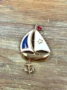 Vintage Avon Sailboat Pin Nautical Fashion brooch Red White and Blue Gold Tone Patriotic Boat and Anchor Lapel Pin Dimensions: 2 7/8" tall x 1 5/8" wide Condition: Good vintage. One hard to see scuff mark on the boat hull. Normal wear for age and use.  International Buyers will need to contact me for a custom shipping quote. PLEASE READ POLICIES BEFORE PURCHASE! Item Quality:  Please keep in mind that most vintage items are previously owned and have been used or displayed for the past 20-200 years and some aging can be expected. Also due to their often personalized or hand crafted nature, the manufacturer or artist may unintentionally produce imperfections in the product which often make them unique.  Feel free to email me ahead of time with any questions or concerns.  Shipping Addresses I Nautical Fashion, Vintage Avon, Holiday Time, Lapel Pin, Red White And Blue, Lapel Pins, Blue Gold, Nautical, Red White