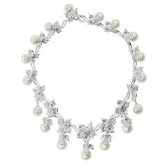 This unique Designer South Sea Pearl and Diamond Necklace by Luxurman is just spectacular, featuring delicate Flower Design and nearly 16 carats (15.67ct) of top VS quality diamonds set in 18k gold around 17 South Sea Pearl, a truly one of a kind necklace! Elegant Diamond Necklace With Jewels For Formal Occasions, Elegant Diamond Necklace For Formal Occasions, Luxury Flower-shaped Jewelry For Wedding, Luxury Flower Jewelry For Wedding, Elegant Diamond Bridal Necklace With Jewels, Luxury Flower-shaped Jewelry For Evening, Luxury Flower Jewelry For Evening, Luxury Flower-shaped Evening Jewelry, Exquisite Flower Shaped Jewelry With Diamond Accents