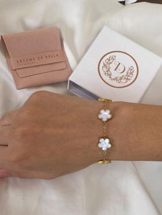 Our Lana bracelet is a beautifully crafted piece, combining elegance with durability. Made from high-quality stainless steel, it is both resistant to tarnish and corrosion, ensuring long-lasting wear. The bracelet features delicate clover motifs, which are gold-plated to add a touch of luxury and sophistication. The gold plating offers a brilliant shine, perfectly complementing the sleek, polished finish of the stainless steel. This timeless design makes the bracelet versatile, ideal for both ca Lana Bracelet, 5 Leaf Clover, Trendy Bracelet, Clover Bracelet, Trendy Bracelets, Clover Charm, Leaf Charms, Leaf Clover, Clover Leaf