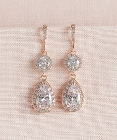 "I've created the Evelyn Earrings with crystals and soft tone rose gold settings for a beautiful and classic look. I use all high quality chain/materials and all my jewelry is nickel free. LARGE SET Total length of earrings: 2\" Earrings are 5/8\" at their widest point. Length of Dangle portion of earring: 1 1/2\" Necklace focal measures 1 5/8\" long SMALL SET Total length of earrings: 1 3/4\" Earrings are 1/2\" at their widest point. Length of Dangle portion of earring: 1 1/4\" Necklace focal m Wedding Jewelry Crystal, Rose Gold Bridal Earrings, Crystal Wedding Jewelry, Crystal Bridal Earrings, Bracelet Rose Gold, Gold Bridal Earrings, Rose Gold Bridal, Stud Style, Jewelry Crystal