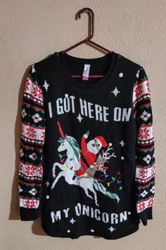 Ugly Christmas light up women's embroidered knit sweater that says 'I Got Here On My Unicorn' Size large. Funny holiday sweater lights up with small battery pack in pocket on inside of sweater. Battery pack can be unhooked to wash. Previously owned, lightly worn. Funny Holiday, Holiday Humor, Christmas Light, Holiday Sweater, Winter Holiday, Battery Pack, Winter Holidays, Ugly Christmas, Christmas Sweater