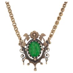 Handmade Victorian antique emerald pendant necklace circa 1860s. 4.50ct oval emerald center stone, set in a natural patina pendant setting. The 19.25 inch chain also has natural patina. There are hidden loops for a drop beneath the Emerald. The chain detaches at the pendant, there is no catch. The GIA has certified the emerald as F1, minor clarity enhancement. 1 oval green Emerald, approx. total weight 4.50cts, F1, GIA certificate #2181881786 Large 12.62 x 9.76 x 6.57mm Length: 19.25 inches 14k yellow gold Tested: 14k Stamped: Not 27.6 grams Width: 3.42mm – Depth: 3.35mm Please Note, we photograph each item as accurately as possible. However due to monitor/mobile device resolution and calibration, we understand some photos may vary in appearance. If you are not satisfied, we offer a 30-day Luxury Ornate Oval Necklaces, Luxury Vintage Oval Pendant Necklace, Emerald Pendant Necklace, Cabin Door, Emerald Necklace Pendant, Gia Certificate, Victorian Gold, Emerald Pendant, Victorian Jewelry