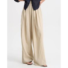 A Fresh Breeze of Style: Pleated High Waisted Wide Leg Pants Welcome to your new fashion obsession - the Pleated High Waisted Wide Leg Pants! Crafted with a blend of cotton and linen, these pants are the epitome of comfort and style, perfect for your spring and summer adventures. Product Features Style: Casual Season: Spring/Summer Waist Type: High Fabric Type: Herringbone Pattern Type: Plaid Pant Style: Wide leg pants Material: Cotton and Linen blend Fit Type: Loose Length: Full length Closure Plaid Pant, High Waisted Wide Leg Pants, Herringbone Fabric, Pantalon Large, Plaid Pants, Summer Adventures, Hip Length, Summer Wardrobe, Fashion Pants