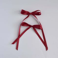 The Olivia grosgrain ribbon hair bow adds a fun and feminine touch to any look. Perfect for any occasion that needs a little extra flair! The Olivia bow is a versatile and stylish accessory making it a must-have for younger girls and women. Available in both short and long lengths. Dimensions: Mini bow 4.5” W x Tails 5” L • Longtail bow 4.5” W x Tails 8” L Grosgrain Ribbon Bows, Mini Bow, Golden Trio, Hair Ribbons, Mini Bows, Elastic Hair Ties, Ribbon Hair, Small Bows, Velvet Bow