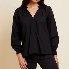 Size Small, Estelle Peasant Blouse In Jet Black. Never Worn. This Nation Ltd Estelle Peasant Blouse Is The Perfect Pick For A Cool Yet Chic Look! Cut With A Mock Neck, Balloon Sleeves, And Smocking At The Cuffs, This Blouse Will Give Your Wardrobe A Sassy Edge! Plus, The Side Slits Make For A Fashionable (And Comfy!) Finish. Your Closet Just Hit The Stylish Jackpot. Sizing Details: True To Size Materials & Care: 100% Pima Cotton Machine Wash Elegant V-neck Peasant Top For Fall, Chic Relaxed Fit Peasant Top For Fall, Black Blouse With Blouson Sleeves, Chic Black Peasant Top For Spring, Elegant Peasant Top For Daywear In Fall, Elegant Fall Peasant Top For Daywear, Elegant Peasant Top For Fall Daywear, Versatile Black Tops For Daywear, Black Peasant Top For Fall