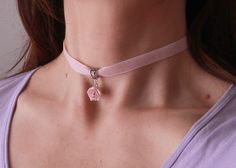 "Velvet light pink ribbon choker with sculpted powder pink rose. Material of rose is polymer clay. Each petal of flower made by hand Dia flower about 13-15 mm/0.45- 0.55 \" Length of necklace is adjustable: 10-12 inches/ 25,4 - 30,5 cm 11-13 inches/ 28-33 cm 12-14 inches/ 30.5- 35.5 cm 13-15 inches/ 33-38 cm 14-16 inches/ 35.5 cm-40.5 cm 15-17 inches/ 38,1 cm- 43,2 cm 16-18 inches/ 40.6 cm- 45.7 cm 17-19 inches/ 43 cm - 48 cm 18-20 inches/ 45,5- 50.8 cm Τhe length you choose considered to be wit Delicate Pink Necklace With Rose Design, Pink Adjustable Choker As A Gift, Handmade Pink Choker As Gift, Handmade Pink Choker As A Gift, Adjustable Pink Necklace With Rose Design, Rose Design Choker Necklace, Gift Rose Design Choker In Rose Color, Rose Design Choker As Gift, Pink Feminine Choker Jewelry