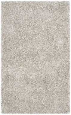 Shimmering with the luster of satin, Toronto shag rugs radiate style and sophistication. A brilliant blend of textured yarns infuse this collection with striking highlights and comforting texture. Hand-tufted using soft synthetic yarns, Toronto shags boast a cushioned feel underfoot and high performance in any room. Now available in smart selection of boho-chic designs.Pile Height: 1.25 inches Light Grey Rug, Solid Area Rugs, Grey Color Palette, Textured Yarn, Contemporary Bedroom Decor, Grey Rug, Light Grey Area Rug, Luminous Colours, Polyester Rugs