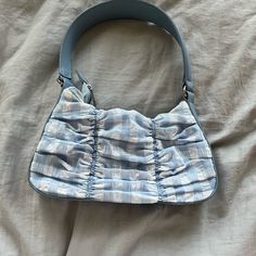 This Is A Blue And White Bag That I Have Never Worn, It Is New Blue Baguette Tote Bag, Trendy Blue Shoulder Baguette Bag, Trendy Blue Baguette Shoulder Bag, Light Blue Tote Shoulder Bag For Spring, Trendy Blue Satchel Baguette Bag, Trendy Blue Baguette Bag For Everyday, Everyday Blue Satchel Baguette Bag, Everyday Blue Baguette Satchel Bag, Everyday Blue Baguette Bag