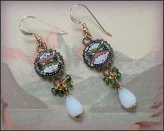 "Vintage Micro Mosaic Earrings - 14K Gold Filled Fish Hook Ear Wires - Milk Glass and  Tourmaline Bead Drops  A pretty pair of Micro Mosaic earrings.  We have up-cycled these from vintage earrings to modern fish hook wires and added the milk glass drops. The colored mosaic pieces are bezel set in a gold tone setting. The earring featured tiny green tourmaline cluster beads. The pair measures 1/4\" by 2-1/8 inches to the end of the drop.  These one of a kind pieces are all made of vintage compone Mosaic Pieces, Micro Mosaic, Tourmaline Beads, Fish Hook, Green Tourmaline, Gorgeous Necklaces, Vintage Earrings, Tourmaline, Gold Filled