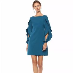 Nwt Vince Camuto Teal Crepe Ruffle Sleeve Shift Dress Split Ruffled Sleeves Add Voluminous Charm To This Work-To-Play Shift, Fashioned In Soft Crepe. Approx. 34.5” Length Hidden Back-Zip Closure Bateau Neck Long, Split Ruffle Sleeves Partially Lined 88% Polyester, 12% Spandex Size 6 A-line Dress With Pleated Sleeves For Brunch, Fitted Midi Dress With Ruffle Sleeves For Cocktail, Fitted Dress With Draped Sleeves For Fall, Formal Mini Dress With Ruffle Sleeves, Chic Formal Dress With Ruffle Sleeves, Mini Length Pleated Sleeve Dress For Brunch, Spring Knee-length Mini Dress With Sleeves, Mini Dress With Pleated Sleeves For Brunch, Mini Length Dresses With Pleated Sleeves For Brunch