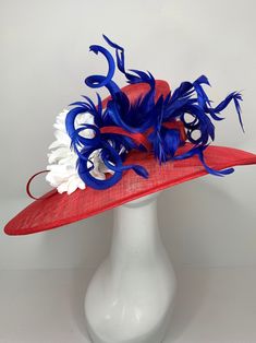 Red White and Blue Kentucky Derby Hat, Tea Party Hat & Church Hat! Make your statement with this stunning, high quality piece! *100% Brand new, hand made and high quality. *Head circumference: 22.5" and adjustable *Beautiful detail **Elegant fashion hats are perfect for horse racing events, church, the Kentucky derby, weddings, garden tea parties and charity events. ** Available to ship next business day. Don't forget matching gloves to complete the look! You can find them here! https://www.etsy.com/shop/QueenSugarBee?ref=seller-platform-mcnav&section_id=17799374 Ordering 4 or more pieces? Message me about group discounts! Like our Facebook page for future sales and new designs! Please join us here: https://www.facebook.com/QueenSugarBee Hear what others are saying about our shop: Jennifer Hat Tea Party, Kentucky Derby Fascinator, Church Hat, Tea Party Hats, Kentucky Derby Hat, Tea Party Garden, Charity Events, Derby Hat, Church Hats