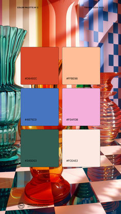 there are many different colored vases on the table