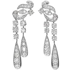 An incredible pair of Graff earrings designed in a swirl motif and suspending diamond drops with the finest Graff round diamonds weighing appx 10.65cts. The earrings are mounting in shimmering 18k white gold and measure 2.37" in length by 1/2" wide. Graff Jewelry, Graff Diamonds, Pearl Chandelier Earrings, Diamond Chandelier, Bridal Jewels, Diamond Jewelry Designs, Art Nouveau Jewelry, Expensive Jewelry, Diamond Drop Earrings