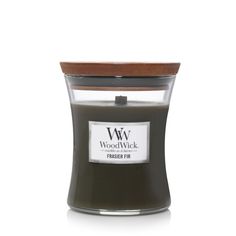 a candle that is sitting in front of a white background with the words woodwick on it