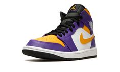 The Air Jordan 1 Mid “Lakers” is a colorway of the lifestyle shoe that features the team uniform colors of the Los Angeles Lakers on its design.  The Jordan 1 Mid is not officially affiliated with the Lakers in any way, although it does draw favorably from the basketball team’s uniform colors.  Yellow leather appears on the perforated toe and collar while contrasting purple leather is found on the overlays.  A yellow leather Swoosh appears on either side of the shoe and a white “Wings” logo can Air Jordan 1 Orange, Lakers Shoes, Jordan 1 Orange, Sneakers Box, Kobe Shoes, Nike Air Jordan 1 Mid, White Wings, Wings Logo, Sneaker Release