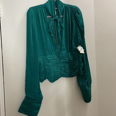 Gorgeous Free People Blouse In Green. Silky Fabric And Adjustable Tie. Item Is A Large, Nwt And Has Extra Button Attached. Spring Ruched Long Sleeve Blouse, Spring Ruched Blouse, Spring Long Sleeve Ruched Blouse, Chic Green Top With Gathered Sleeves, Chic Green Tops With Gathered Sleeves, Long Sleeve Ruched Blouse For Brunch, Long Sleeve Ruched Tops For Brunch, Ruched V-neck Blouse For Work, Spring Green Ruched Blouse