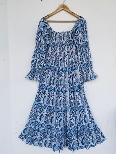 Cotton maxi, hand block print dress, blue printed dress, boho dress, boho maxi, long maxi, smocking maxi dress, bobbin dresses, cotton dresses, vintage gown, smocked maxi, hippie dresses, gauze maxi, gift for her, gift for mom, Christmas gift, festival wear, festival gift, fast shipping  Feel beautiful and confident throughout your days wearing our block printed outfits, made with high quality soft and breathable cotton fabric.  The print on the dress is known as "BLOCK PRINT" which is centuries Bohemian Flowy Floral Dress With Smocked Bodice, Bohemian Floral Dress With Smocked Bodice For Vacation, Cotton Maxi Sundress With Smocked Back, Bohemian Floral Dress With Smocked Bodice, Flowy Floral Print Smocked Maxi Dress, Bohemian Flowy Maxi Dress With Smocked Cuffs, Flowy Bohemian Maxi Dress With Smocked Cuffs, Cotton Maxi Smocked Dress, Bohemian Midi Dress With Block Print