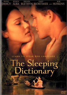 the sleeping dictionary dvd cover with two people kissing each other in front of a lake