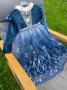 Bring the magic of Frozen to life with this enchanting Elsa dress! Perfect for little princesses who adore the Snow Queen, this princess dress for girls is designed to make your child feel like royalty. Whether it's for dress-up, Halloween, or a birthday party, this Frozen dress is a must-have for any fan of Elsa. Beautiful Design: This Elsa princess dress is made with sparkling details, capturing the essence of the Ice Princess herself. Seasonal Wear: This winter Elsa dress is perfect for the colder months of autumn, winter, and spring, keeping your child cozy and stylish. Multiple Sizes: Available in sizes from 2T to 9T, including 2T Elsa dress, 3T Elsa dress, and 4T Elsa dress, so your little one can find the perfect fit. Versatile Use: This Elsa costume for girls is perfect for any Fro Princess Costume Toddler, Ice Princess Costume, Toddler Princess Costume, Princess Elsa Dress, Frozen Elsa Dress, Costume Toddler, Frozen Dress, Elsa Costume, Frozen Ice