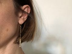 "Modern and chic chain earrings with dangling brass bars.  Handmade in my NYC studio, the textured bars created using the lost wax method and then are cast in brass. Each bar is then strung from gold plated brass chain with 14k gold fill ear wires.   Wear them with multiple other earrings, they are great for layering because of their simplicity and length.  Dress them up or down, wear them with your work attire or with your leather jacket and vintage t-shirt.  Drop length 2 inches Love it but ca Earring Chain, Bar Earring, Chain Drop Earrings, Brass Bar, Earrings Chain, Nyc Studio, Handmade Earring, Bar Earrings, Lost Wax