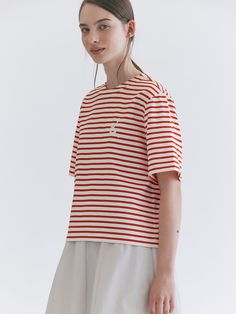 Editor's Noteskotelo's printed stripe t-shirt with a soft texture and unique mood of kotelo. The t-shirt is comfortable and perfect for classic outfits.- Printed stripe t-shirt- T-shirt with a stripe pattern- Has a relaxed silhouette - Semi-cropped length- Logo embroidery on the chest - Creates a casual moodMeasurements (inch)S/M- Chest: 40 inch- Hem: 40.7 inch- Sleeve length: 9.5 inch- Sleeve hole width: 7.3 inch- Sleeve opening: 7 inch- Shoulder: 16.2 inch- Length: 21.1 inch- Waist: 1.6 inchComposition & Care- Outshell: 100% Cotton- Dry cleaning and hand wash- Washing machine may damage the fabric- Air dry the clothes to avoid any damages - Do not bleach in water for more than 30 minutes- Cover the buttons and accessories with foil when dry cleaning- If wet or swe Spring Crew Neck T-shirt With Striped Collar, Everyday Cotton T-shirt With Striped Hem, Cotton T-shirt With Striped Hem For Everyday, Summer Relaxed Fit Tops With Three Stripes, Cotton T-shirt With Striped Hem, Cotton T-shirt With Striped Hem And Relaxed Fit, Cotton Relaxed Fit T-shirt With Striped Hem, Relaxed Fit Cotton T-shirt With Striped Hem, Red Cotton Tops With Signature Stripes