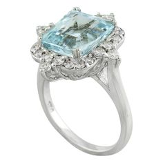 Stamped: 14K Total Ring Weight: 5.6 Grams Aquamarine Weight 4.35 Carat (10.30x9.60 Millimeters)Diamond Weight: 0.70 carat (F-G Color, VS2-SI1 Clarity )Face Measures: 20.65x18.60 Millimeter SKU: [600626] 14k White Gold Diamond Ring, Gold Diamond Ring, White Gold Diamond Rings, White Gold Diamonds, Precious Metals, Aquamarine, All Fashion, Gold Diamond, Diamond Ring