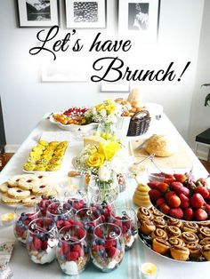 a table filled with lots of food and desserts