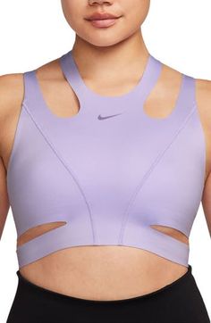 Cutout designs play up the sporty, contemporary style of a moisture-wicking sports bra that offers lightweight support for everyday wear. Dri-FIT moisture-wicking technology Chafe-reducing raw hems Midweight InfinaLock fabric 68% nylon, 32% spandex Machine wash, line dry Imported Nike Sports Bra With Light Support, Nike Racerback Activewear For Light Sports, Modern Moisture-wicking Activewear For Workout, Nike Breathable Sports Bra For Light Sports, Nike Sports Bra With Go-dry For Training, Nike Go-dry Sports Bra For Light Sports, Nike Go-dry Sports Bra For Training, Modern Activewear With Light Support For Gym, Modern Light Support Activewear For Gym