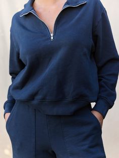 Made with 100% Organic Cotton, the Fleece Half-Zip Sweatshirt features ribbed cuffs and waistband, pockets, and a zippered collar that can be worn up or down. Perfect for layering on a crisp day or lounging at home. - 100% Organic Cotton - Machine wash cold with like colors - Tumble dry low - Do not bleachPlease note t Midnight Blue Color, Black Capri Pants, Fleece Quarter Zip, Half Zip Sweatshirt, Quarter Zip Sweatshirt, Knit Skirt, Zip Sweatshirt, Half Zip, Midnight Blue