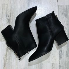 These Classic Black Booties Bring Any Dress Or Casual Outfit Together! Black Faux Leather Boots With Low Heel, Black Heeled Boots With Ankle Strap For Fall, Black Ankle Strap Heeled Boots For Fall, Black Ankle Boots With Buckle Closure, Casual Black Low Heeled Boots, Black Booties With Block Heel For Work, Black Block Heel Booties For Work, Trendy Black Heeled Boots With Buckle Closure, Black Low Heel Booties For Fall