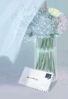 a vase filled with white and pink flowers next to a small card on a table